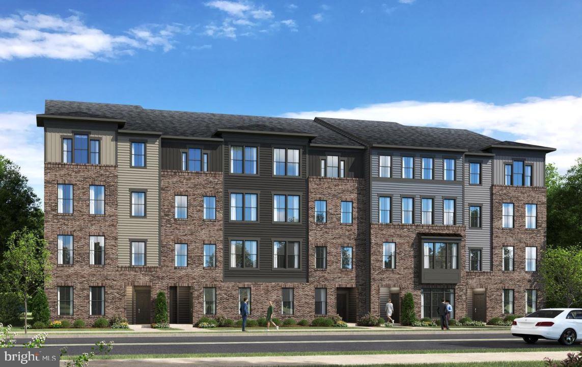 2691 Velocity Road Herndon, VA 20171 - Photo 14 of 15 Modern brick apartment building exterior.