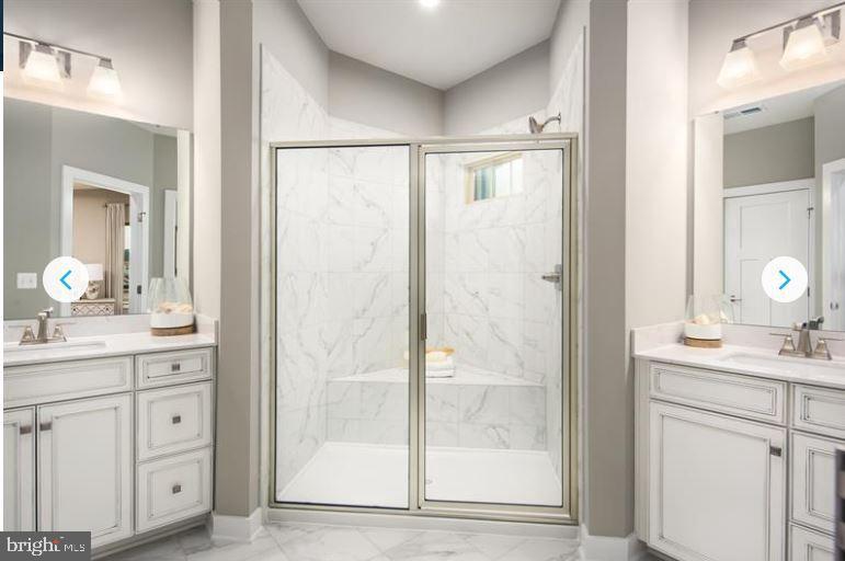 2691 Velocity Road Herndon, VA 20171 - Photo 10 of 15 Elegant marble shower in a modern bath.