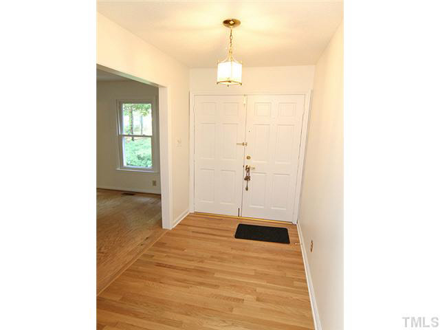 5521 Mapleridge Road Raleigh, NC 27609 - Photo 4 of 24 a bathroom with a sink and a shower