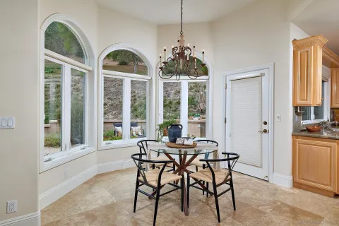 a view of a bench in the backyard