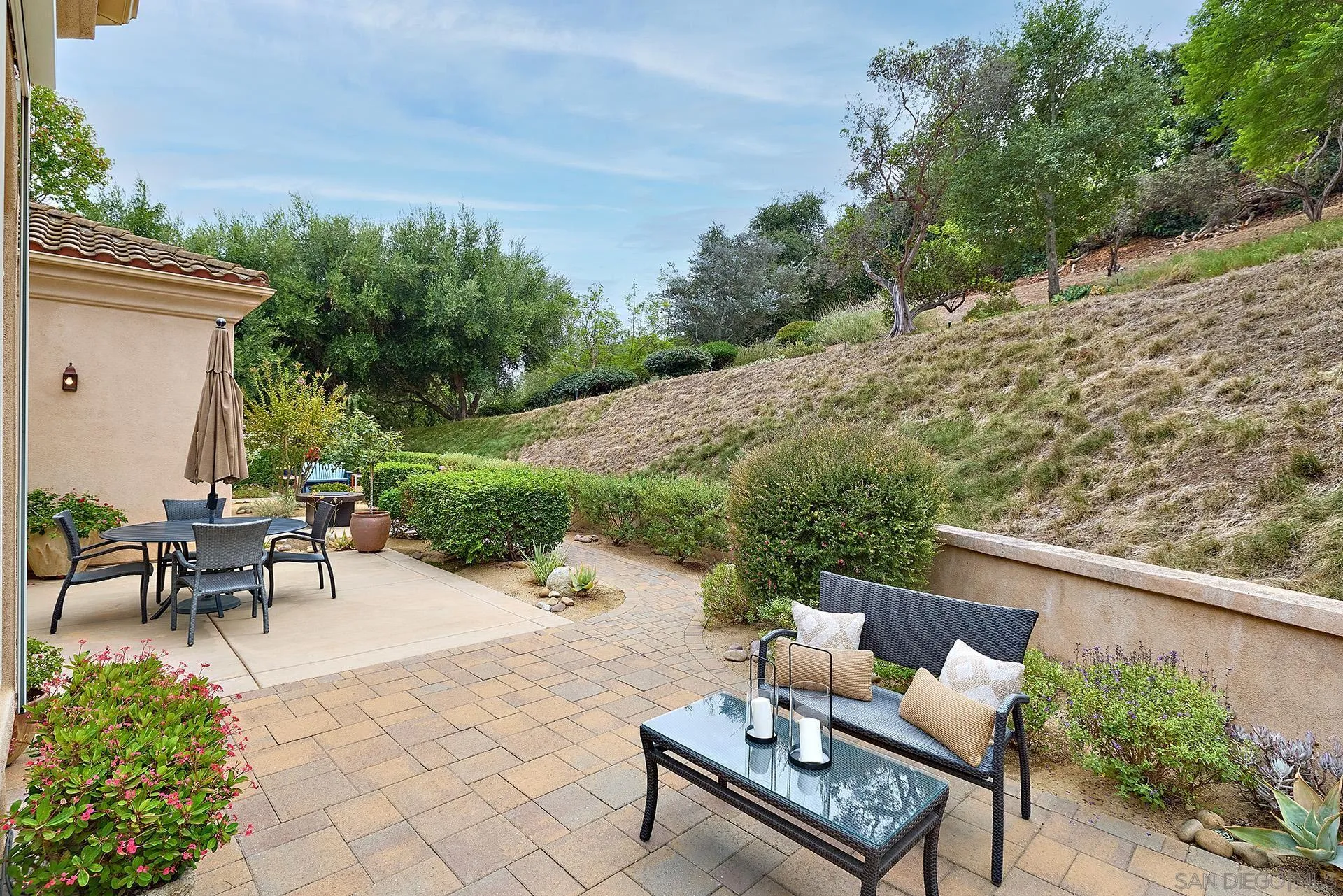 1691 Tecalote Drive Fallbrook, CA 92028 - Photo 16 of 45 a view of a bench in the backyard