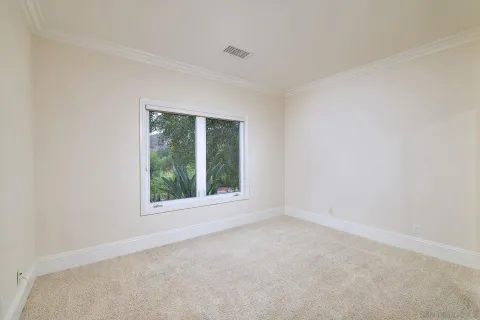 a bathroom with a sink mirror and toilet