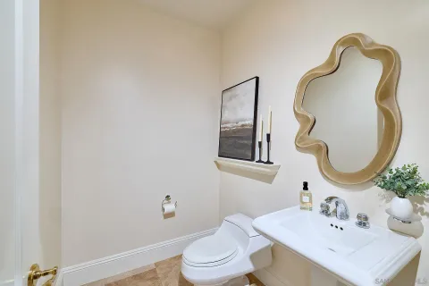 a kitchen with a sink cabinets and window