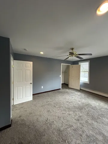 a view of a room with racks on the wall