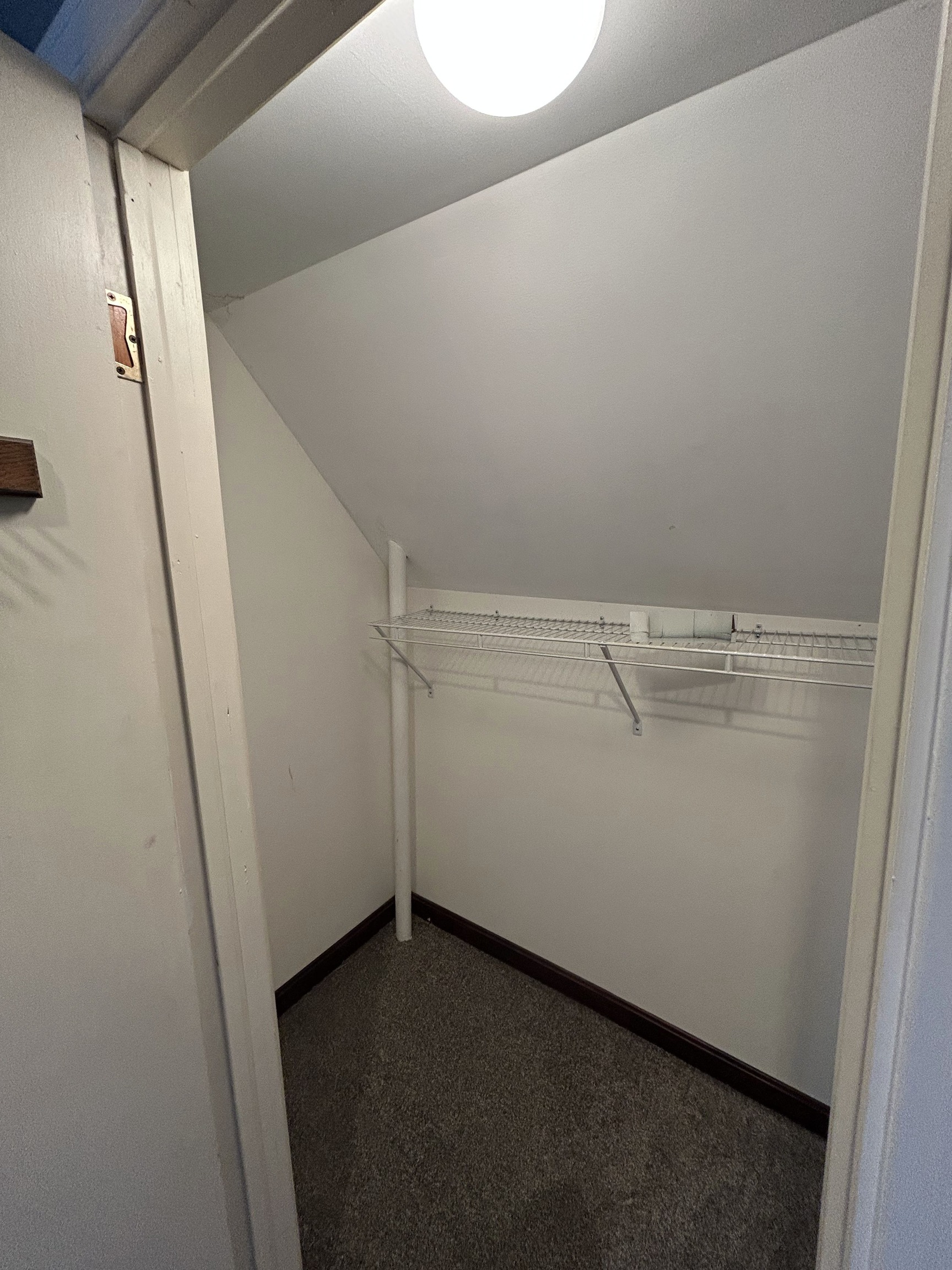 126 Boswell Avenue, Unit 2 Norwich, CT 06360 - Photo 25 of 27 a view of a room with racks on the wall