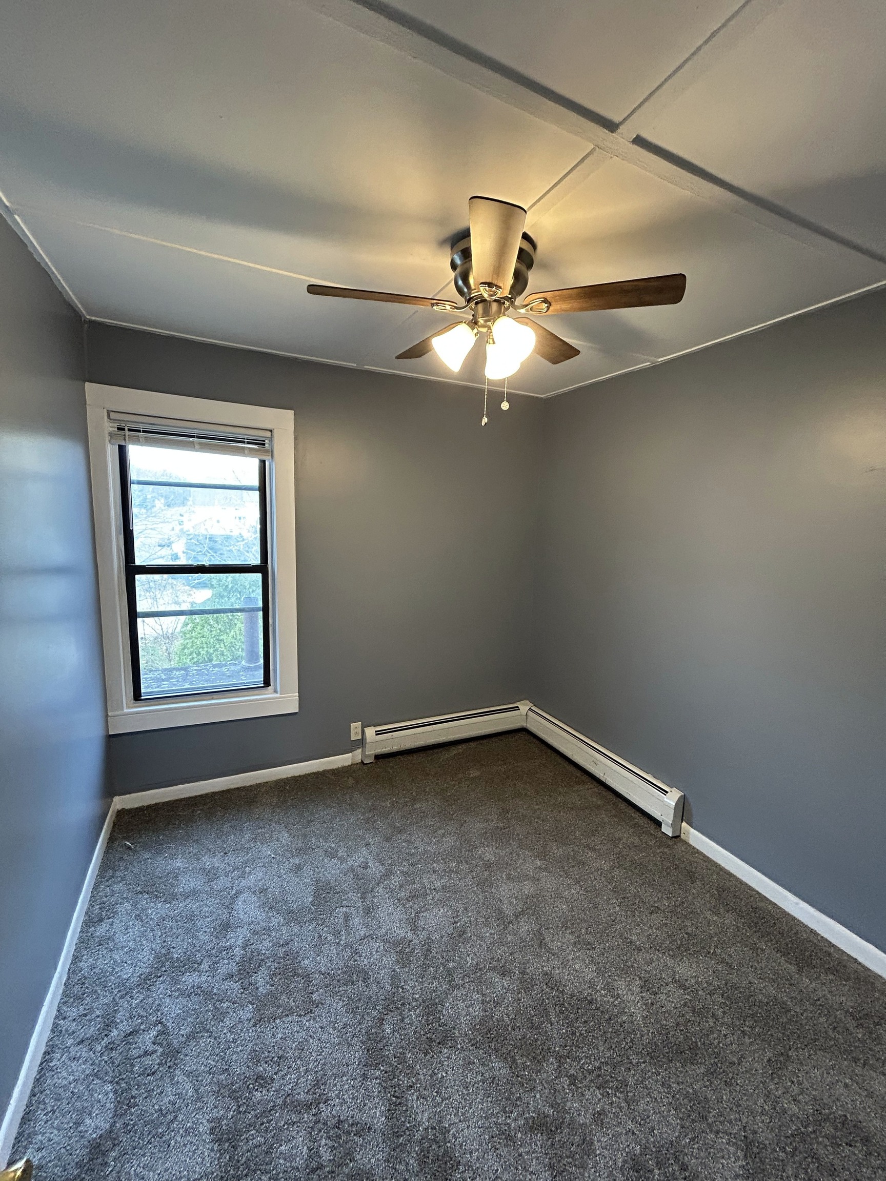 126 Boswell Avenue, Unit 2 Norwich, CT 06360 - Photo 26 of 27 a view of an empty room with a window