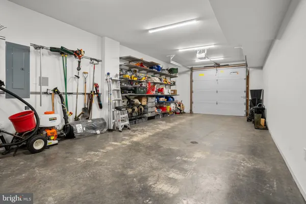 a view of a garage with parked cars