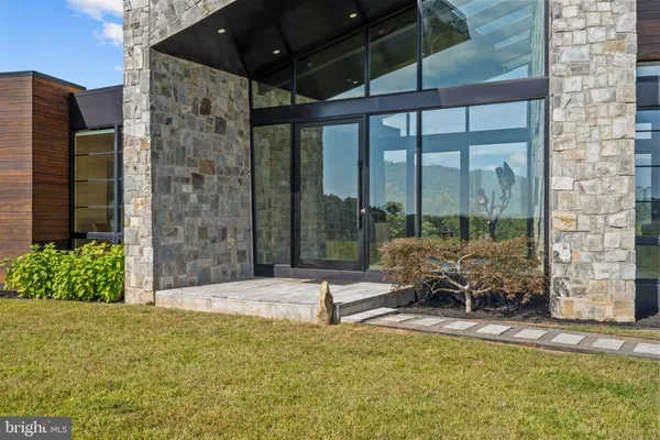 a view of swimming pool with outdoor seating