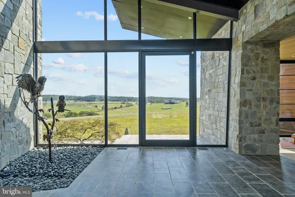 a view of a porch with a furniture