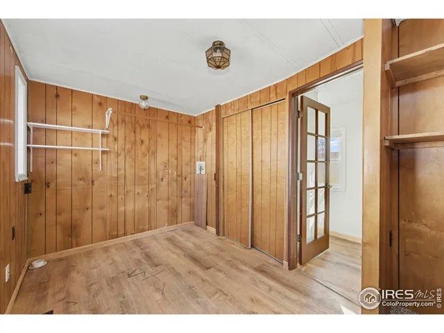 a view of a livingroom with wooden floor