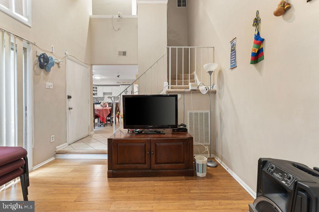 10805 Violet Court Manassas, VA 20109 - Photo 12 of 33 a living room with furniture and a flat screen tv
