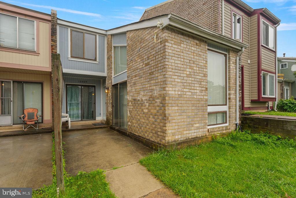 10805 Violet Court Manassas, VA 20109 - Photo 30 of 33 a view of a brick house with a large windows