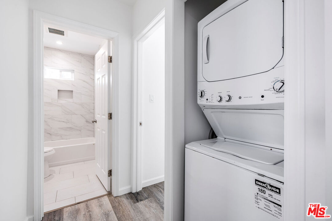 7422 Milwood Avenue Canoga Park, CA 91303 - Photo 9 of 15 a view of bathroom with a washer and dryer