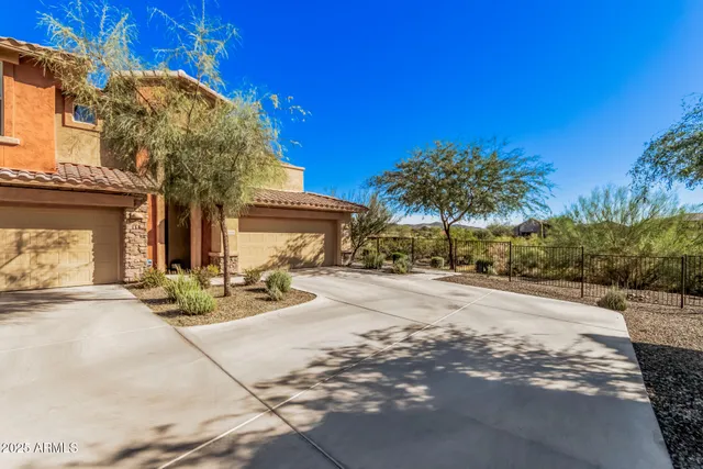 a view of a building with sitting area