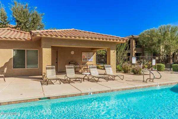 a view of a house with backyard porch and patio
