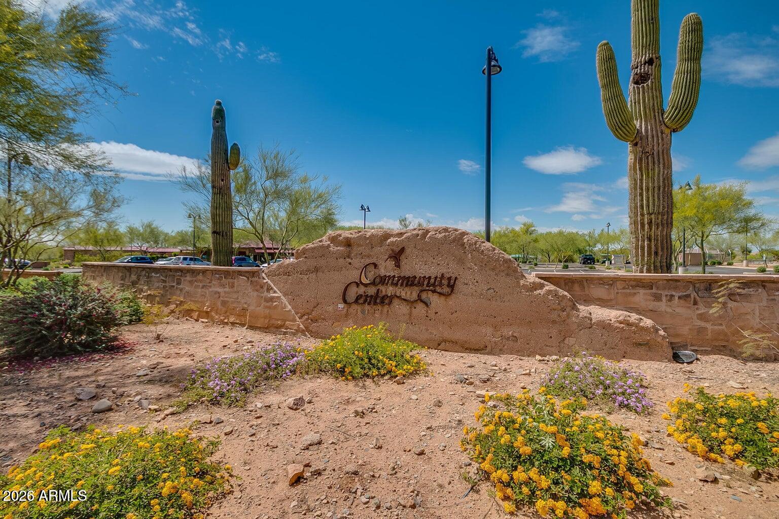 2425 West Bronco Butte Trail, Unit 2010 Phoenix, AZ 85085 - Photo 44 of 44 a view of a street with large trees
