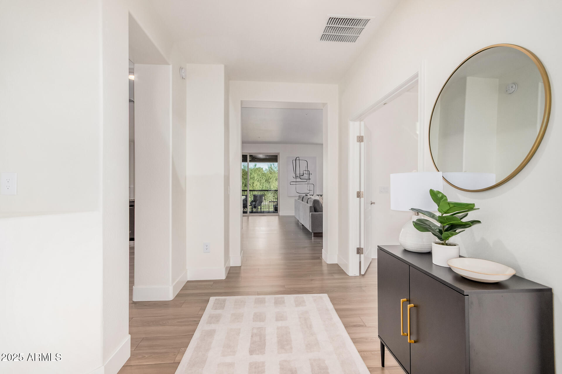 2425 West Bronco Butte Trail, Unit 2010 Phoenix, AZ 85085 - Photo 6 of 44 a view interior of the house and wooden floor