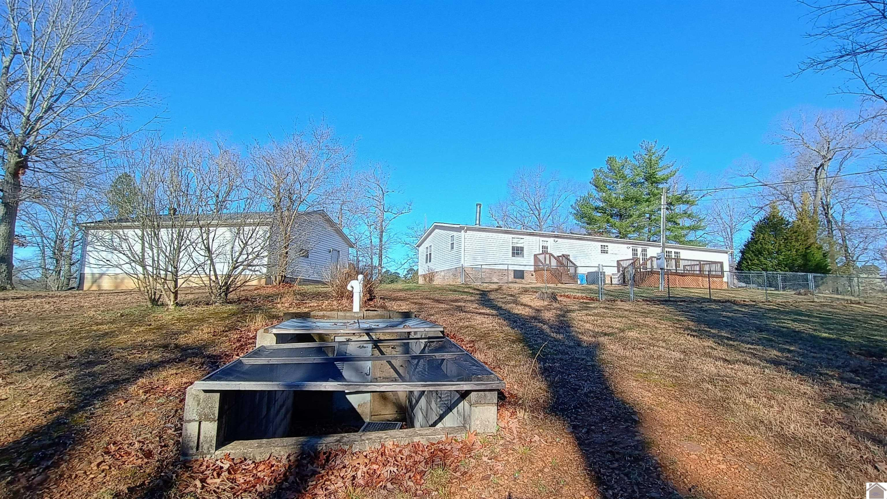 761 Reed Road Benton, KY 42025 - Photo 6 of 32 Rear View and Storm shelter