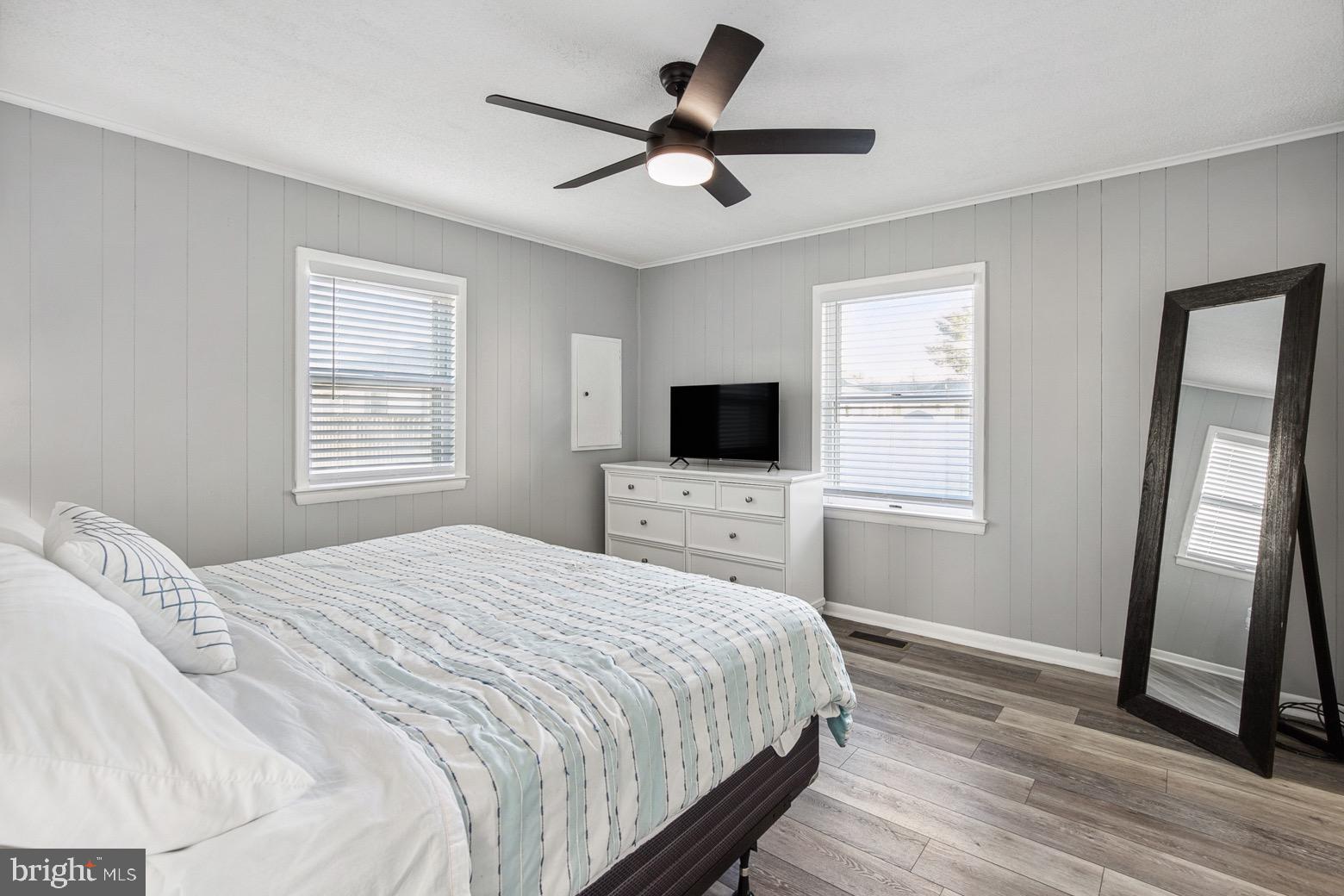 13700 Fiesta Road Ocean City, MD 21842 - Photo 12 of 31 a bedroom with a bed and a flat screen tv