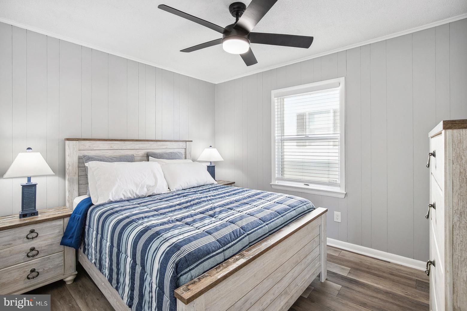 13700 Fiesta Road Ocean City, MD 21842 - Photo 15 of 31 a bedroom with a bed and a window