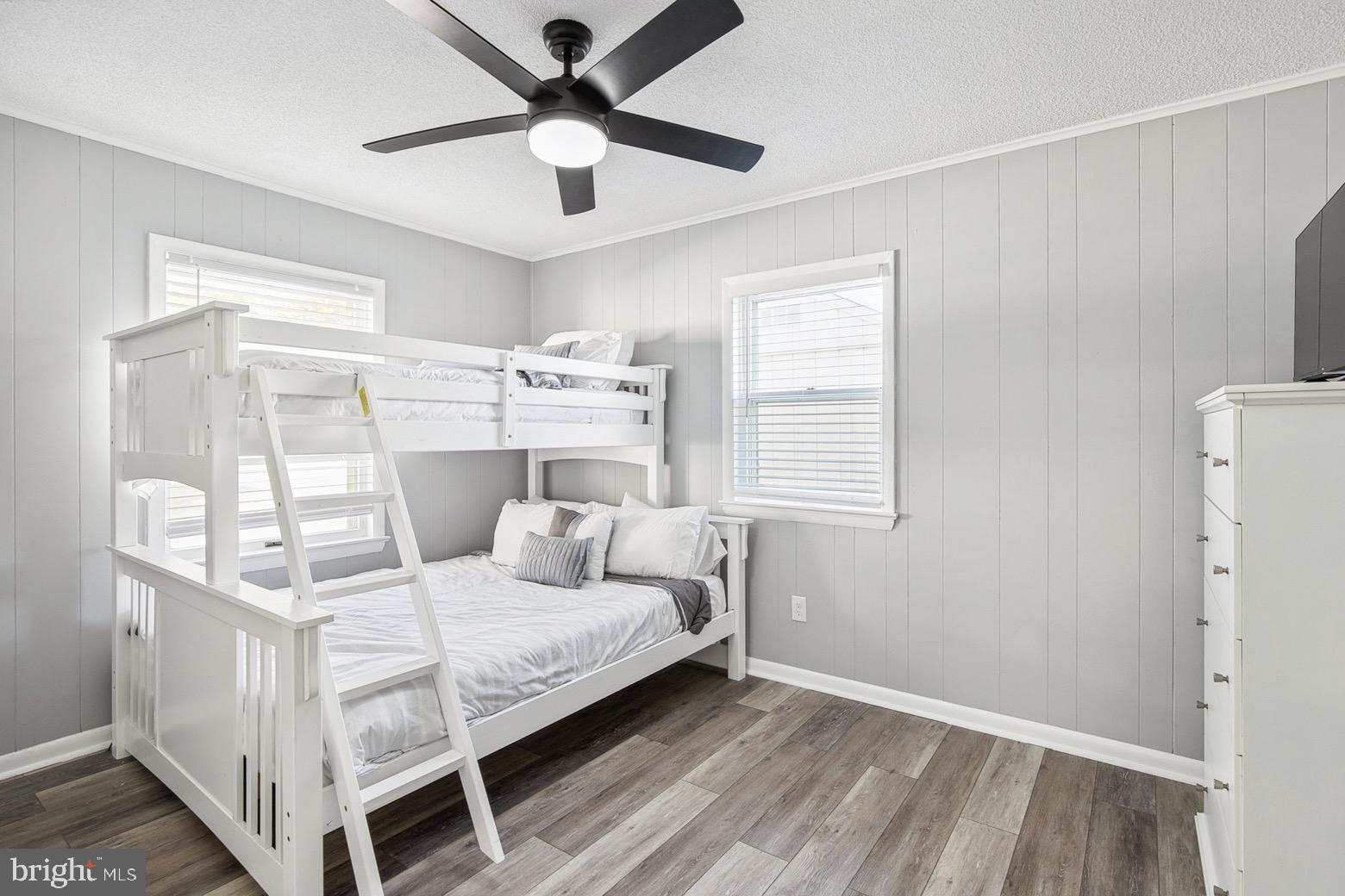 13700 Fiesta Road Ocean City, MD 21842 - Photo 18 of 31 a bedroom with a bed and a window