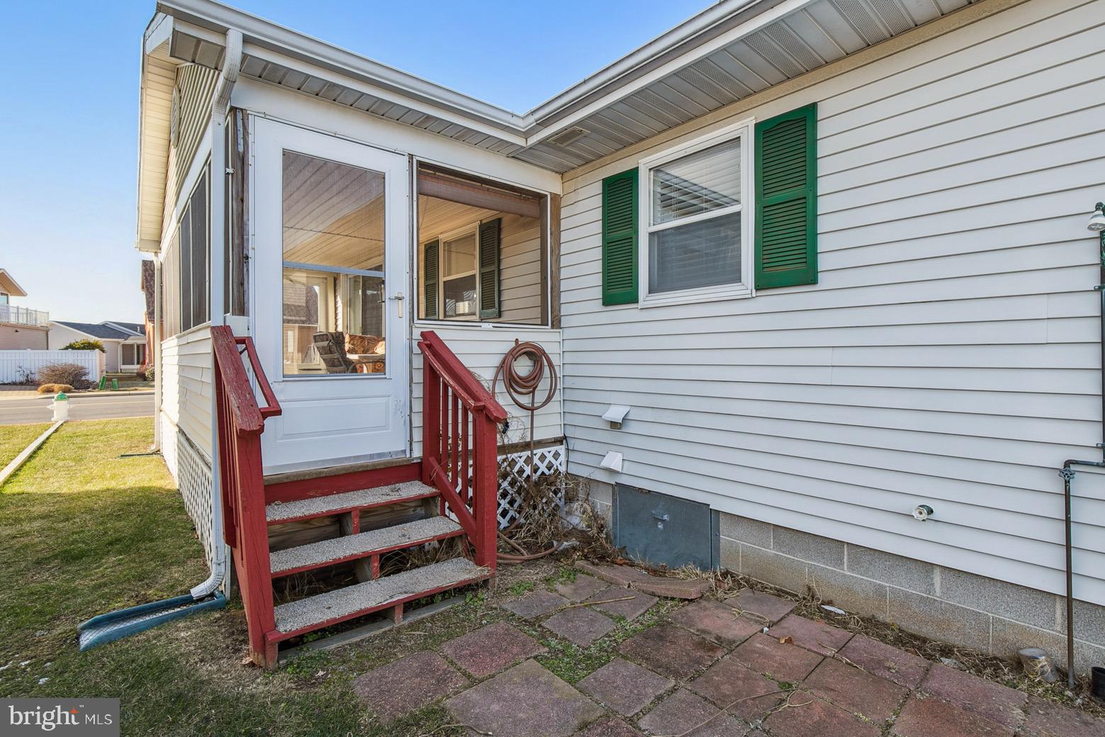 13700 Fiesta Road Ocean City, MD 21842 - Photo 25 of 31 a view of a house with a backyard