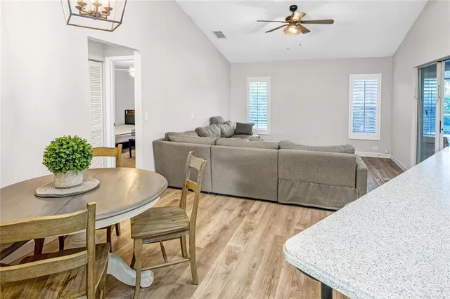 a living room with furniture and a table