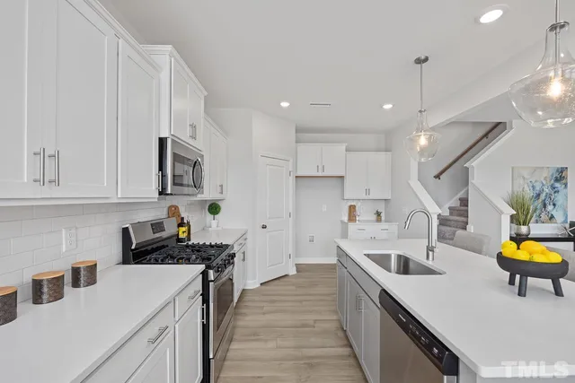 a bathroom with a sink toilet and a bathtub
