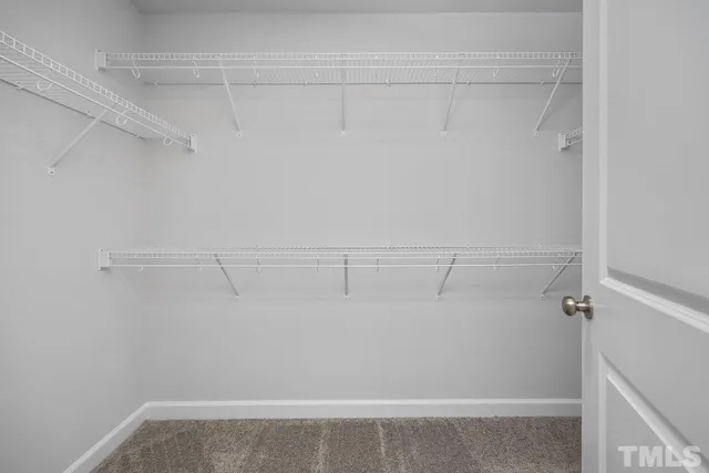 a black and white photo of a living room