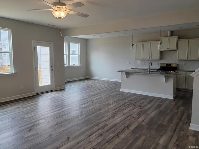 an empty room that has a window