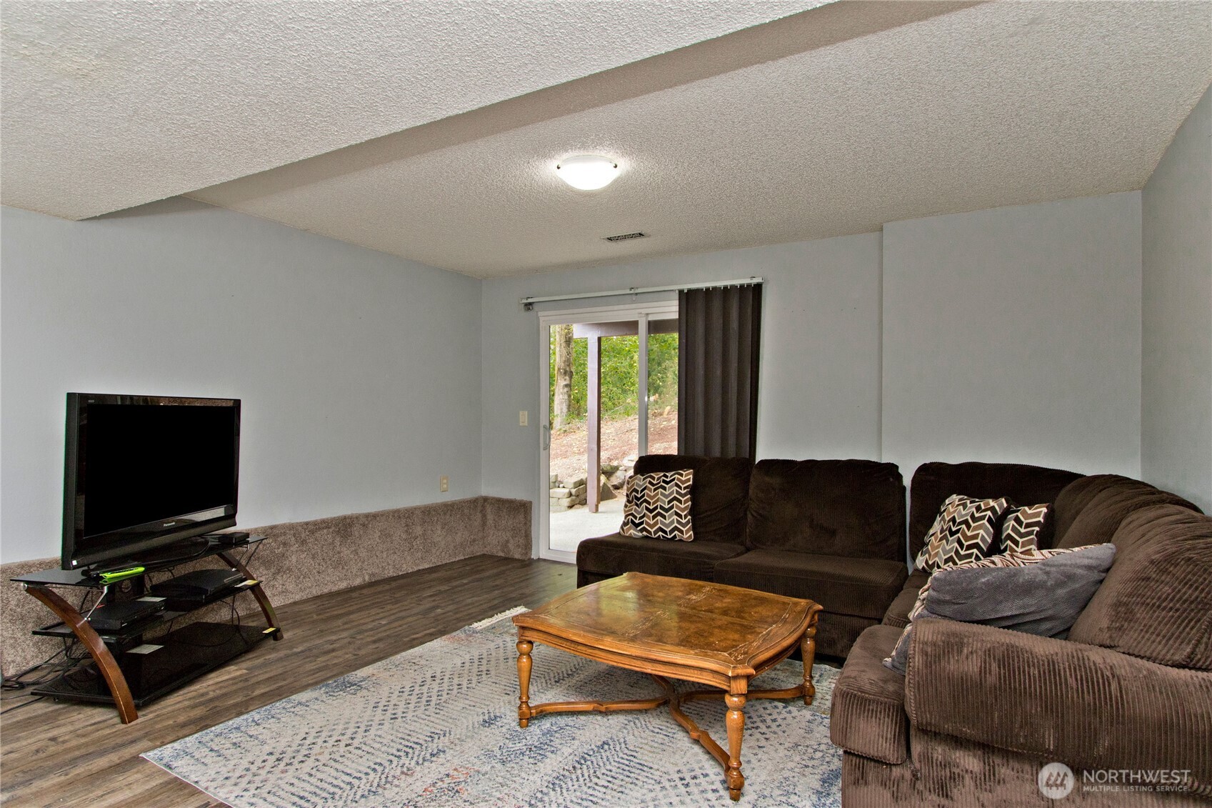 4237 South 326th Place Federal Way, WA 98001 - Photo 16 of 24 a living room with furniture and a flat screen tv