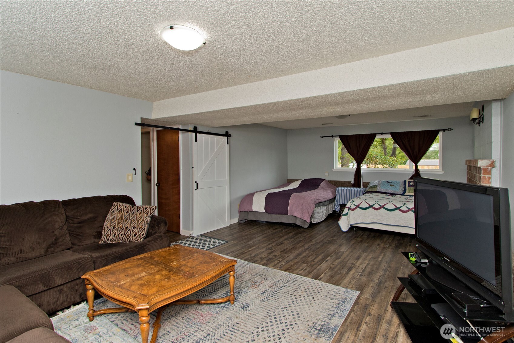4237 South 326th Place Federal Way, WA 98001 - Photo 17 of 24 a living room with furniture and a rug