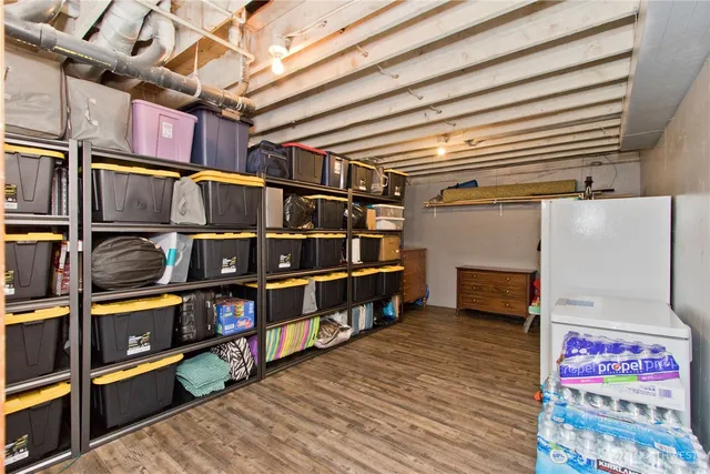a view of a patio with a table and chairs