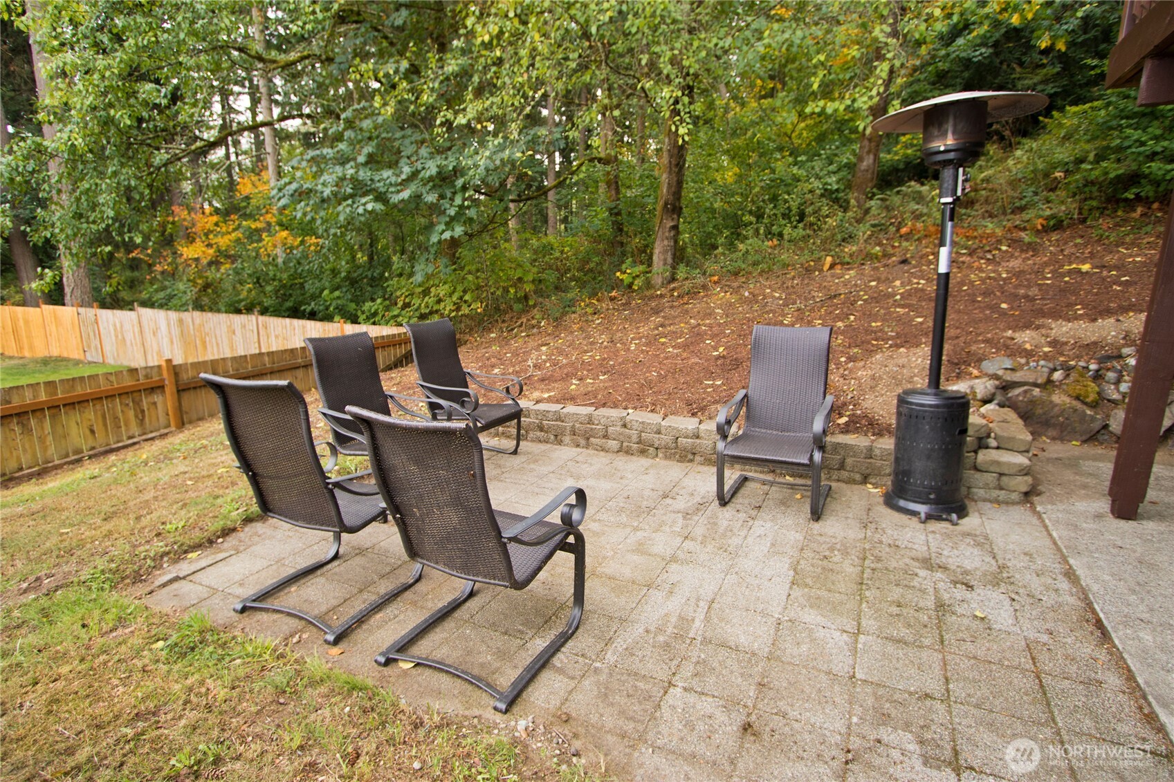 4237 South 326th Place Federal Way, WA 98001 - Photo 20 of 24 a view of a patio with a table and chairs