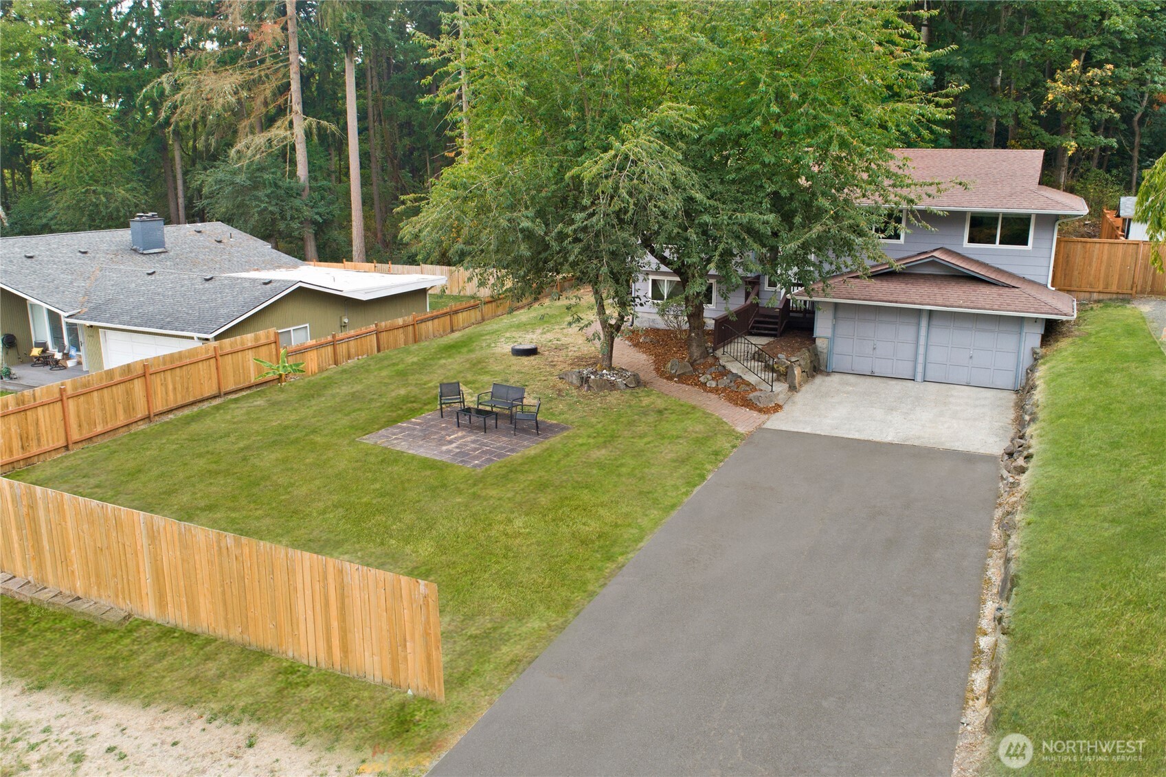 4237 South 326th Place Federal Way, WA 98001 - Photo 2 of 24 a view of a house with backyard and garden