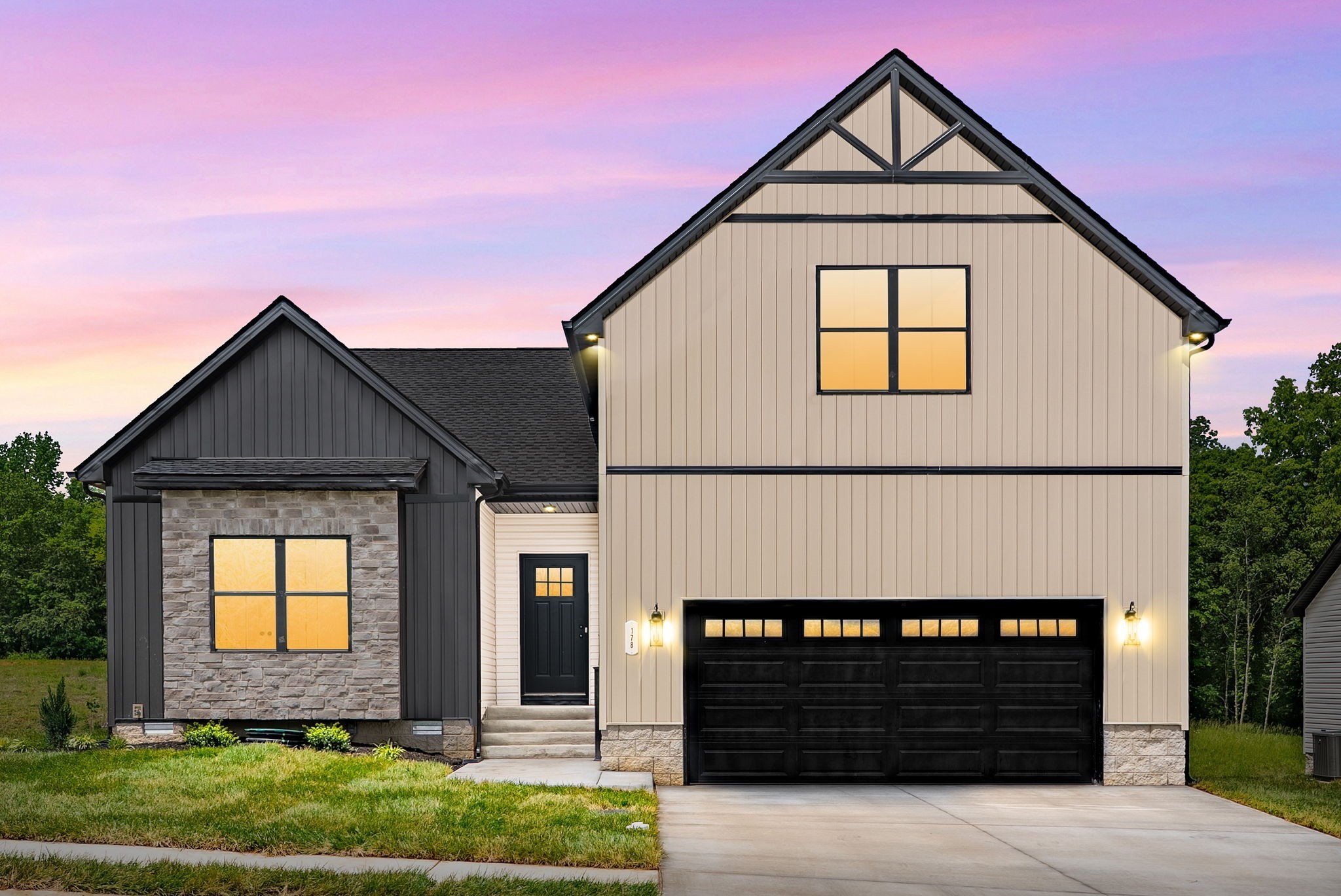 185 Dewberry Road Clarksville, TN 37042 - Photo 2 of 75 a front view of a house with a yard