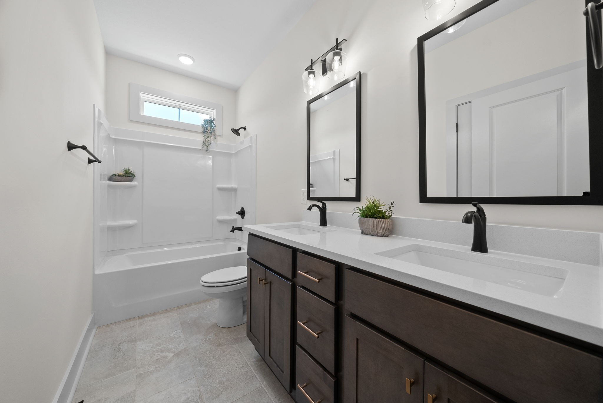185 Dewberry Road Clarksville, TN 37042 - Photo 35 of 75 a bathroom with a double vanity sink toilet mirror and bathtub