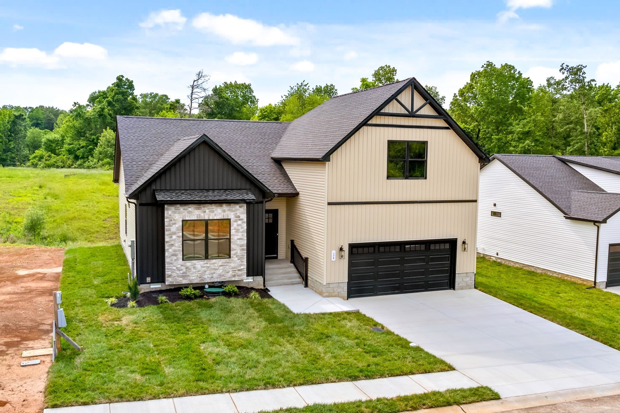 185 Dewberry Road Clarksville, TN 37042 - Photo 4 of 75 a front view of a house with a yard