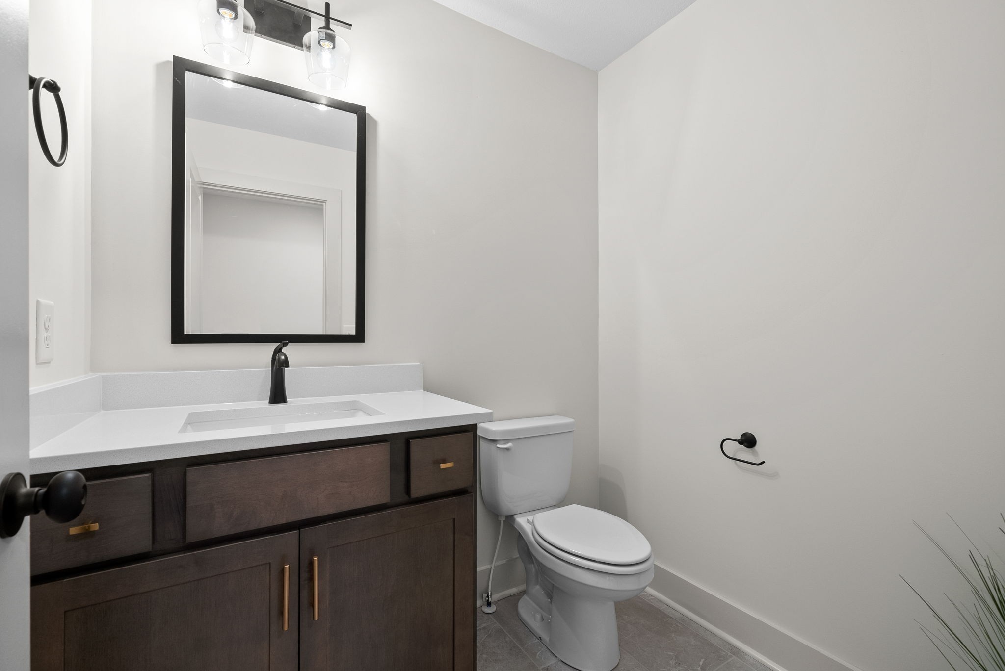 185 Dewberry Road Clarksville, TN 37042 - Photo 43 of 75 a bathroom with a toilet sink and mirror