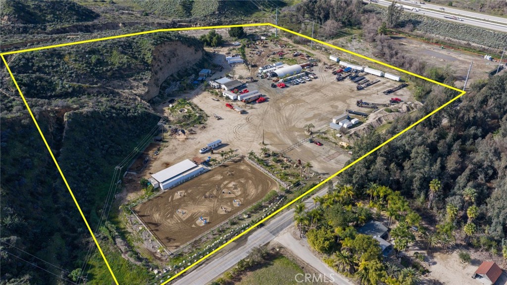 26741 Hostettler Road Corona, CA 92883 - Photo 4 of 6 a view of swimming pool with a back yard