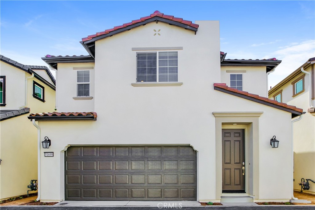 a front view of a house with balcony