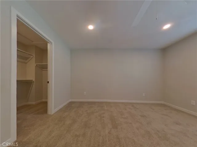 wooden floor and cabinet in an empty room
