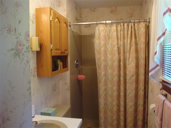 32 Harrisville Road Putnam, CT 06260 - Photo 5 of 11 a bathroom with a shower and a toilet