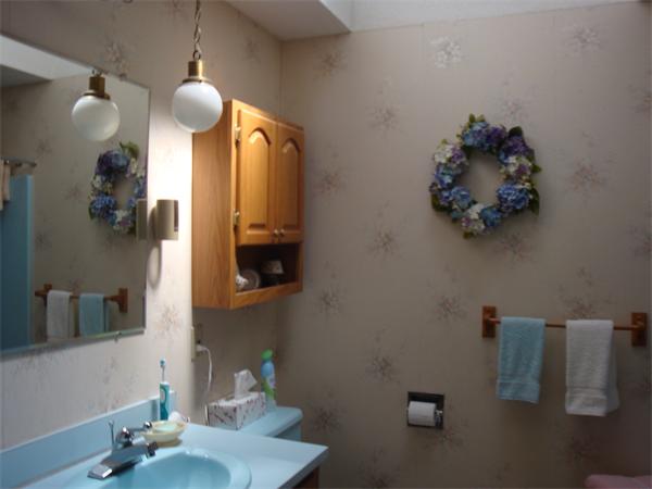 32 Harrisville Road Putnam, CT 06260 - Photo 6 of 11 a bathroom with a sink and mirror