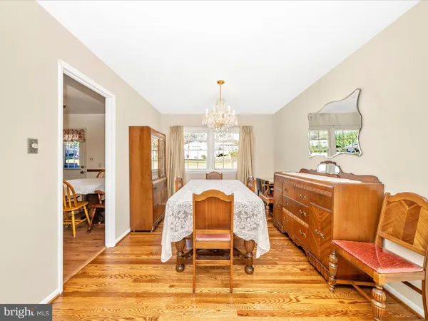 a view of a livingroom with furniture window and front door
