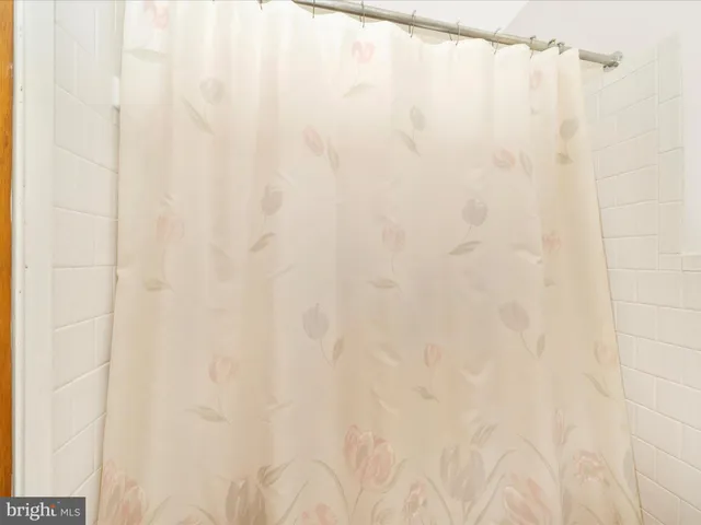 an empty room with furniture and closet