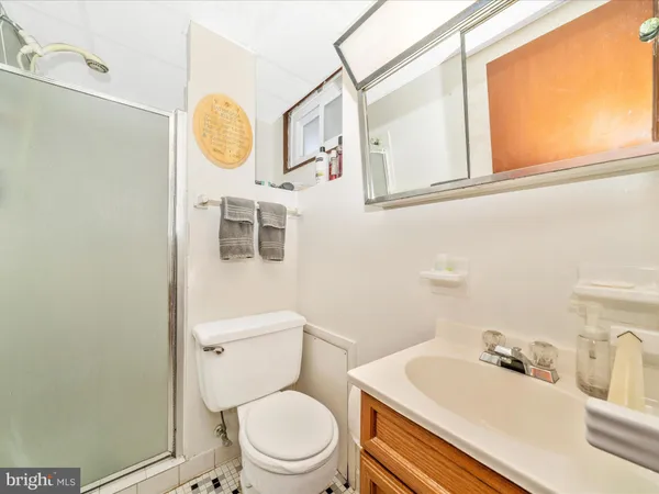 a view of balcony with wooden floor and fence