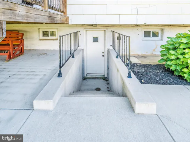 a view of a backyard of the house
