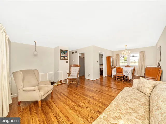 a dining room with a table and chairs