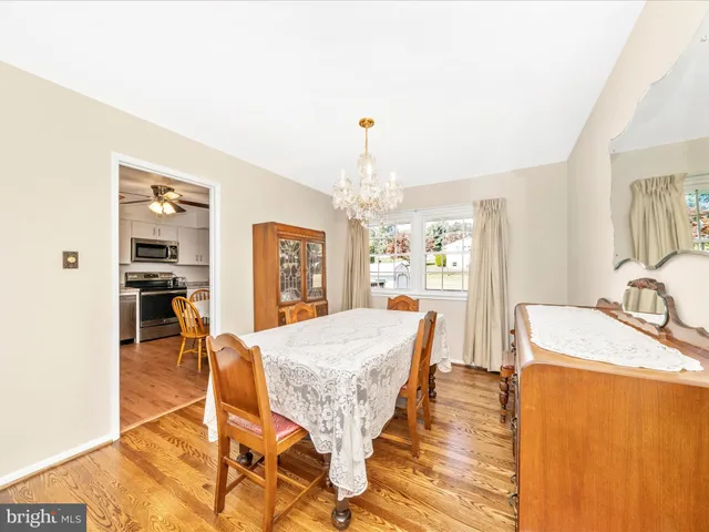 a very nice looking dining room with a table and chairs